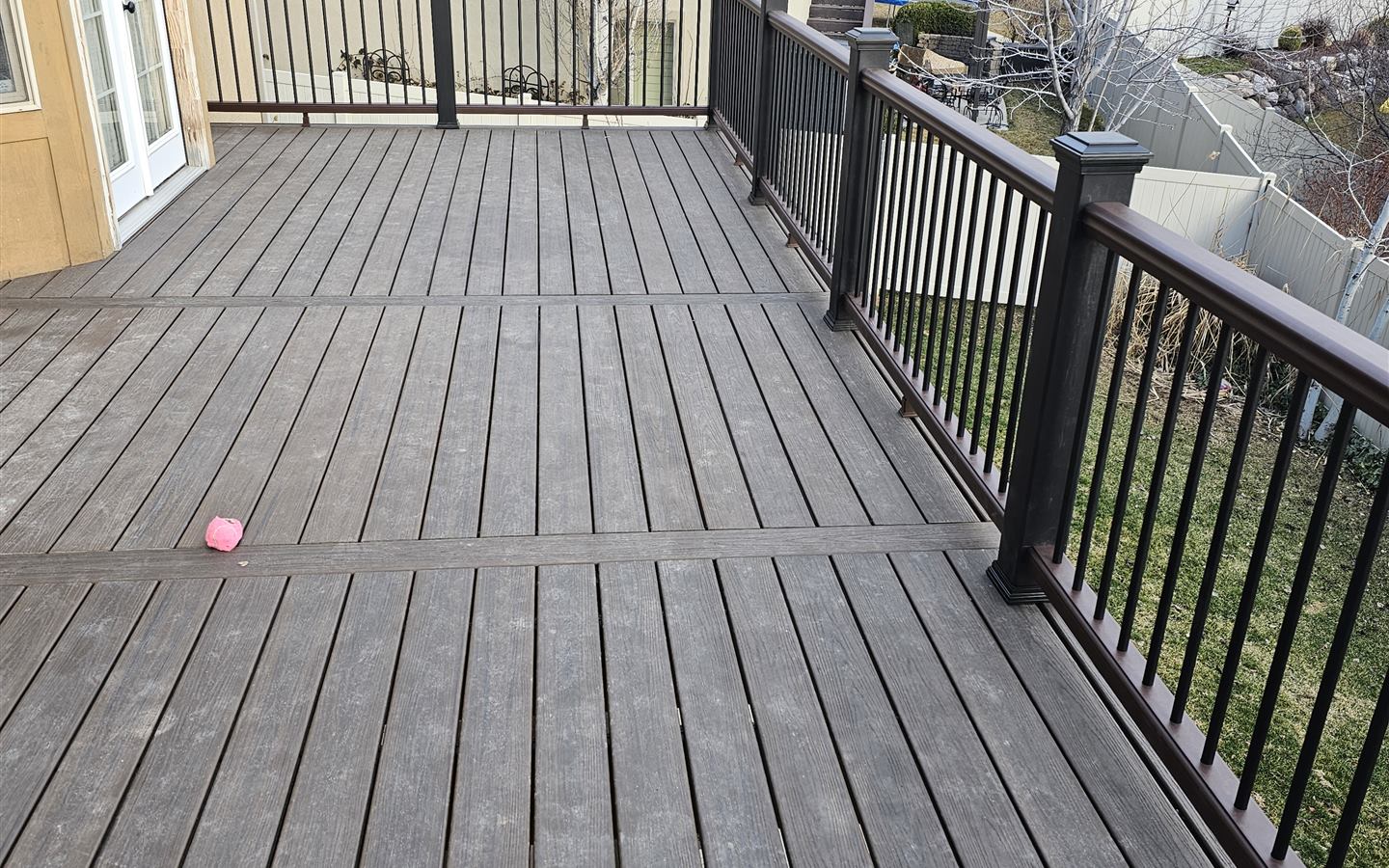Composite deck boards and bronze railing built by Smart Choice